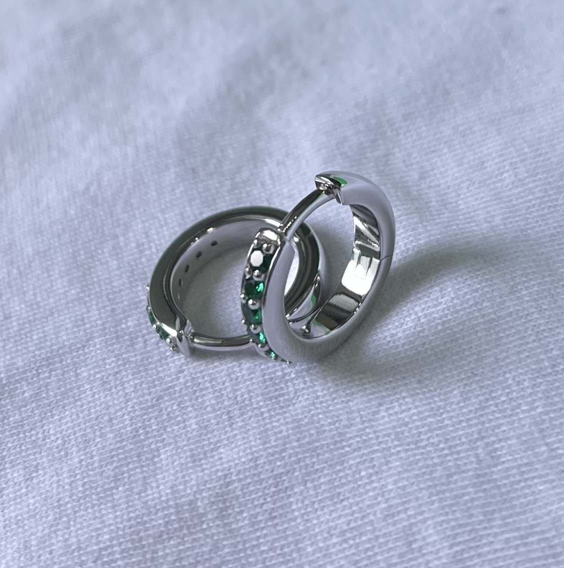 PAVE HUGGIES HOOP EARRINGS. Made of Bronze 14K Gold Plated